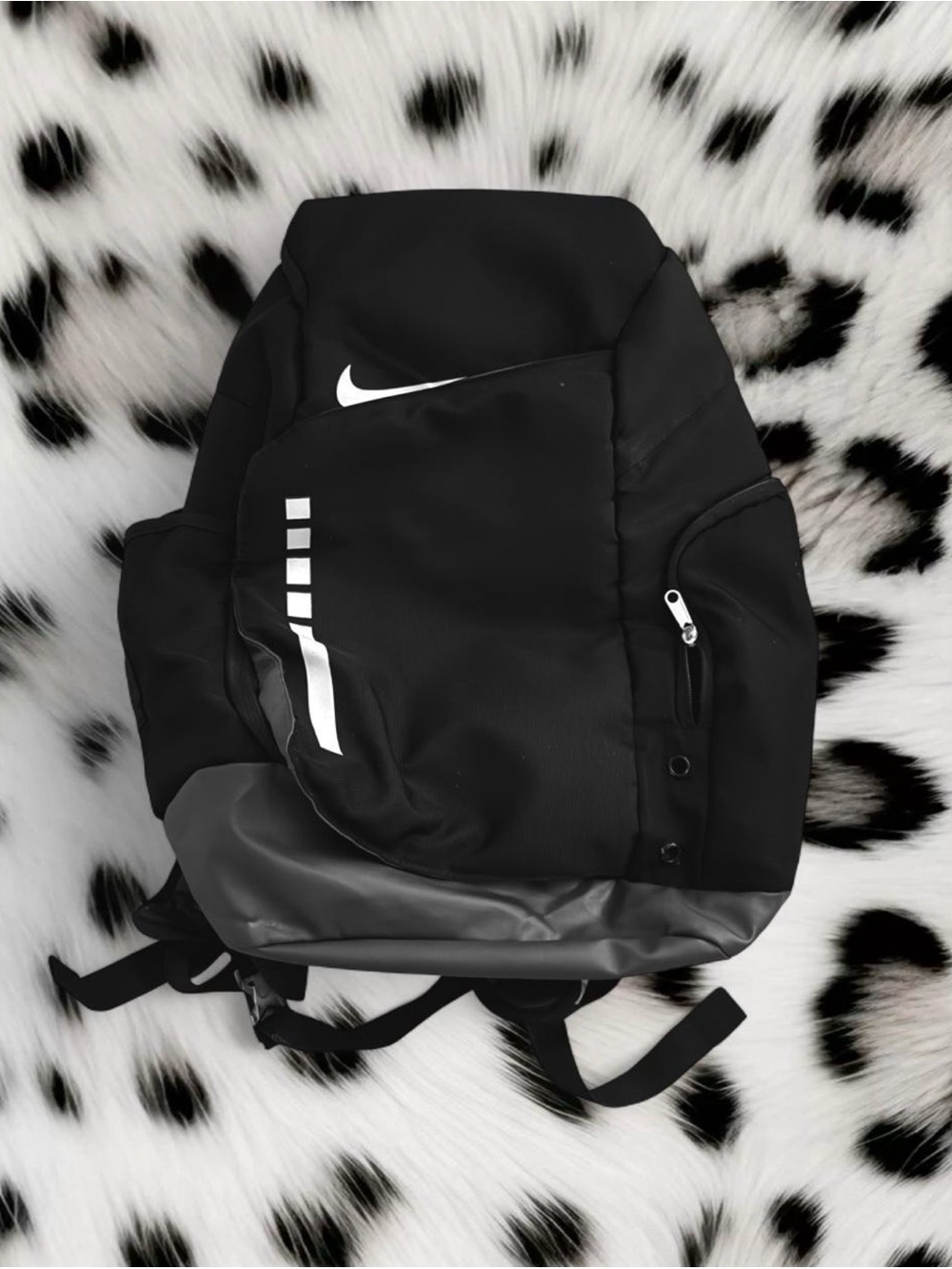 Similar Elite Black Backpack with White Swoosh and Reflective Accents